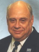 [Photo of Charles Meiser]