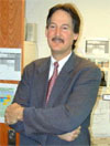 [Photo of Charles Bacon, Ph.D.]