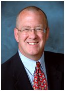 [Photo of Dr. Michael J. Hicks]