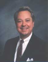 [Photo of James E. Kostrava]