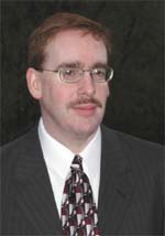 [Photo of John R. LaPlante]