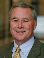 [Photo of Darryl M. White]